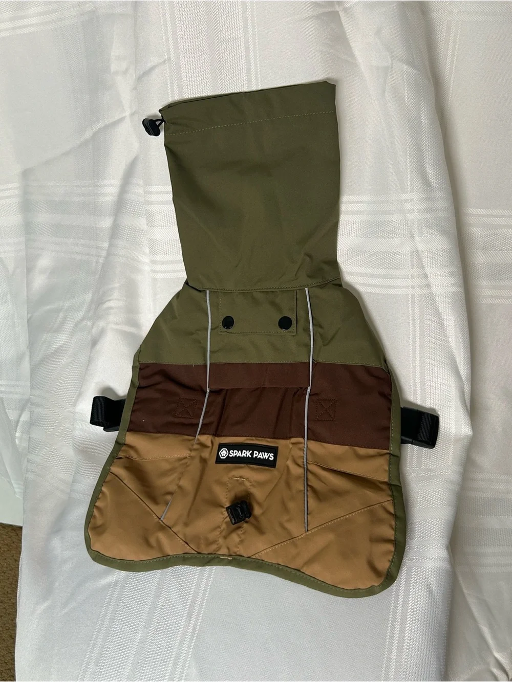Dog clothes medium sized. Raincoat, water and wind proof, reflective detailing.
